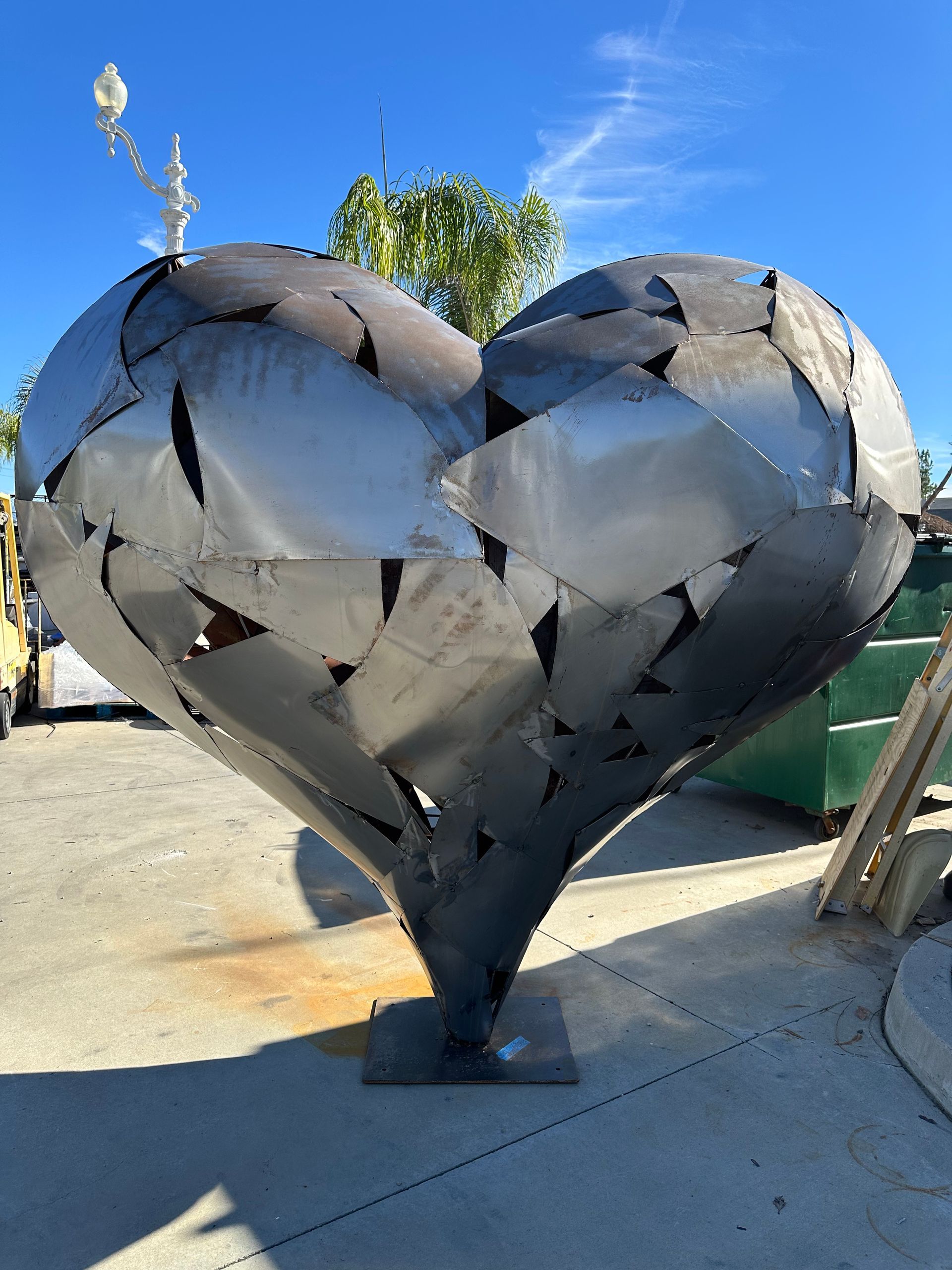 Six-foot faceted steel heart sculpture